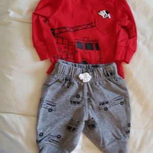 Boy's newborn outfit by Carter's
